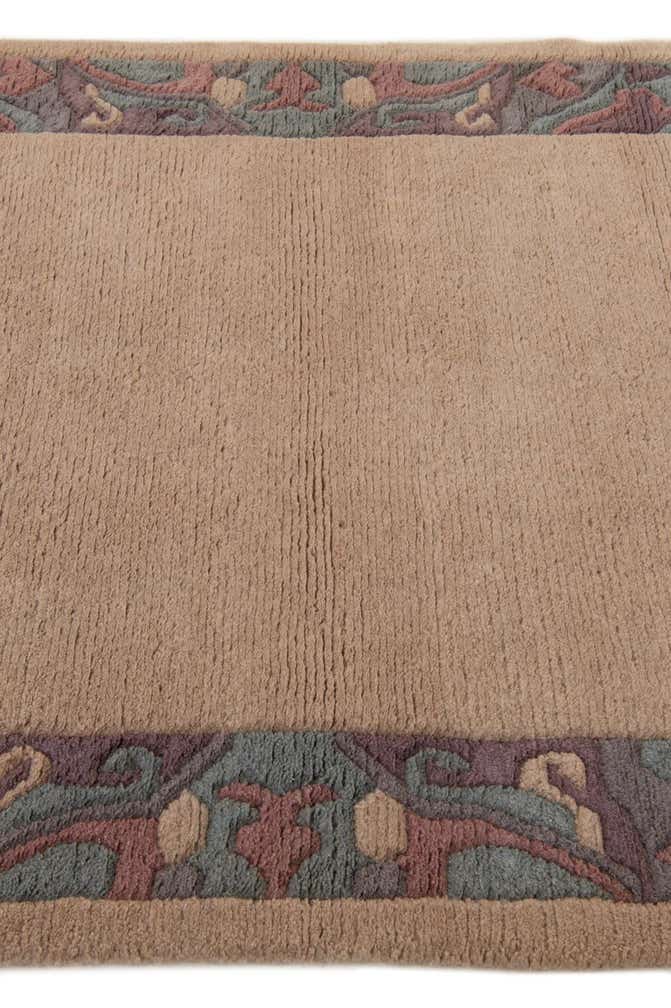 3' 11 x 5' 9 Hand Knotted Tibet Wool Rug
