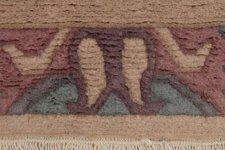 3' 11 x 5' 9 Hand Knotted Tibet Wool Rug