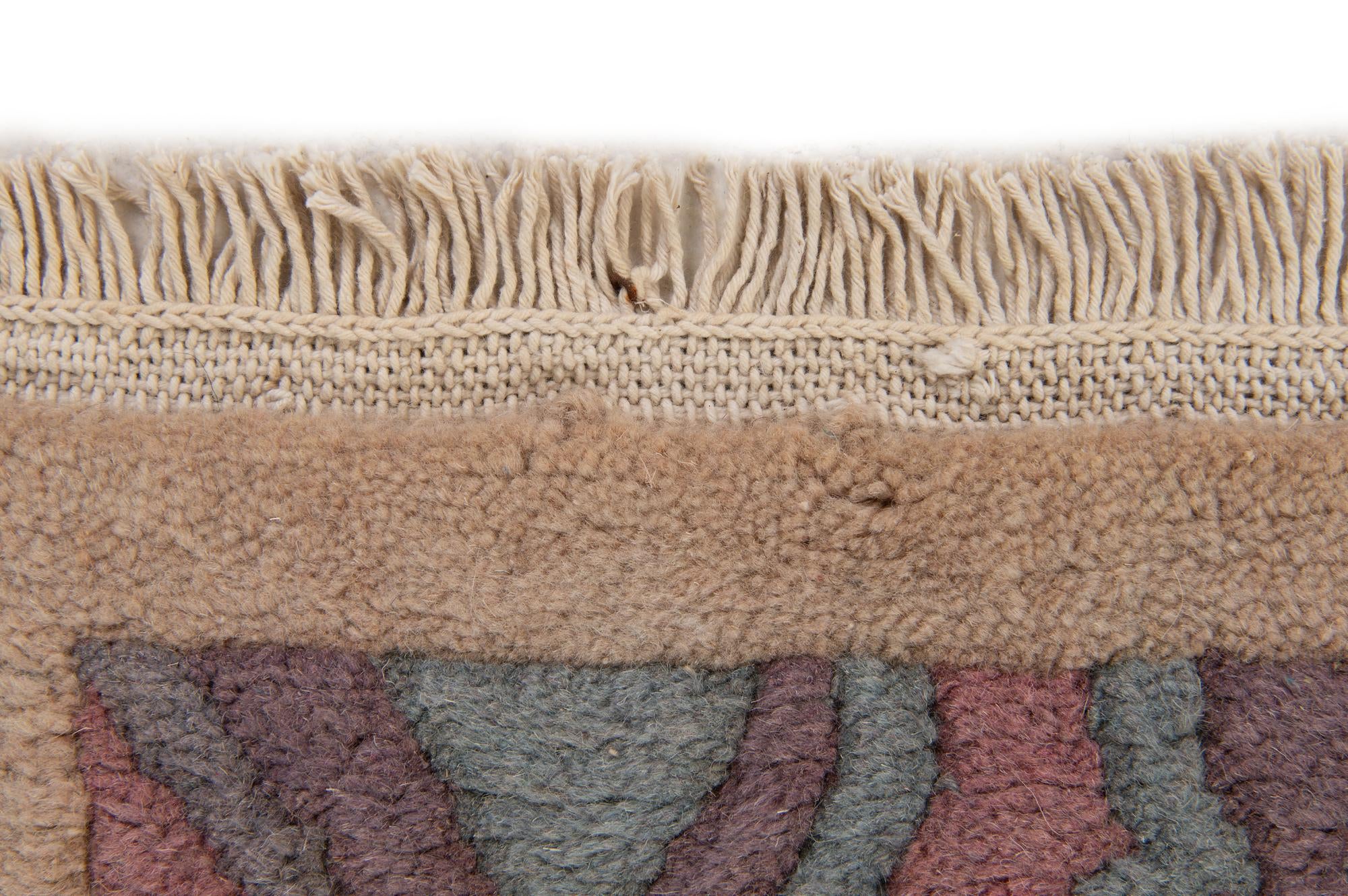 3' 11 x 5' 9 Hand Knotted Tibet Wool Rug