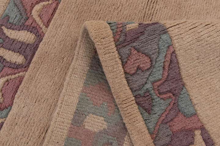 3' 11 x 5' 9 Hand Knotted Tibet Wool Rug