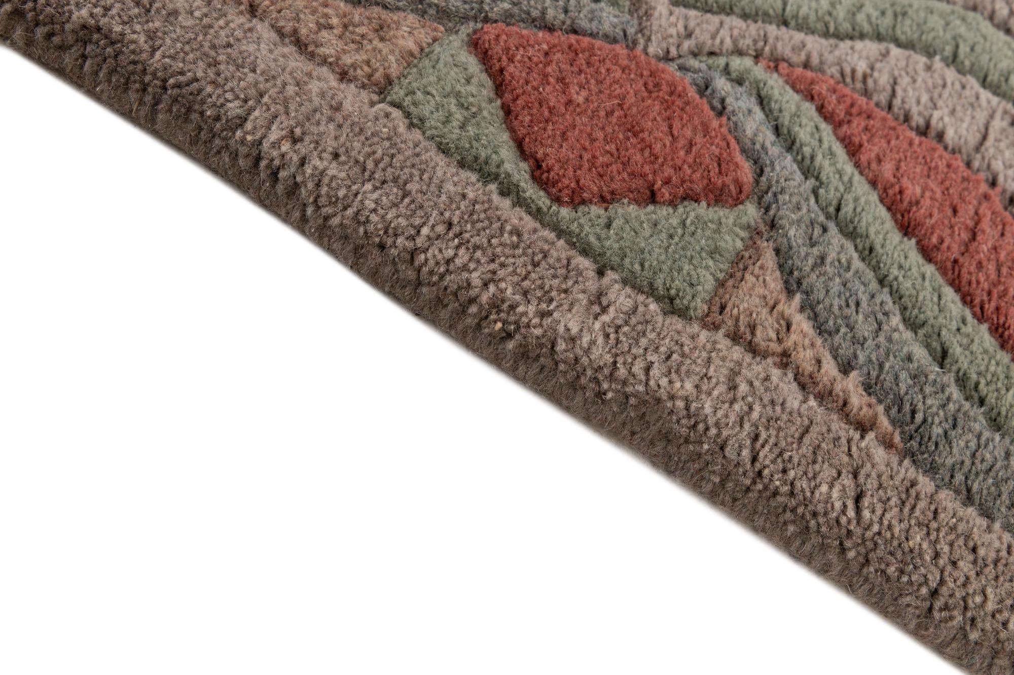 3' 11 x 5' 10 Hand Knotted Tibet Wool Rug