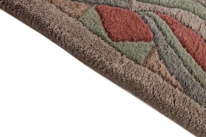 3' 11 x 5' 10 Hand Knotted Tibet Wool Rug