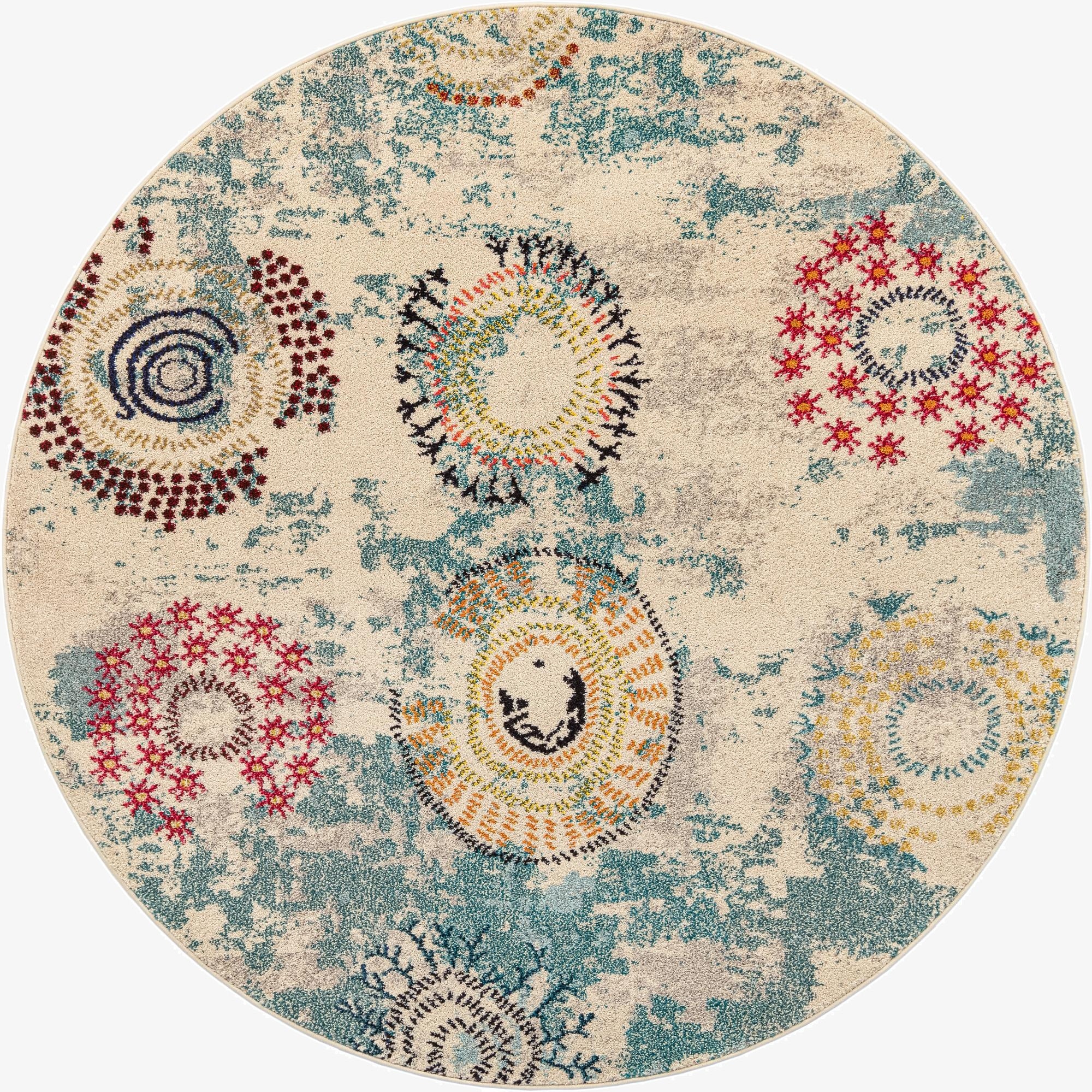 A 6' round Hyacinth rug featuring a cream and tan base with distressed teal accents and colorful botanical medallions in red, orange, yellow, and blue.