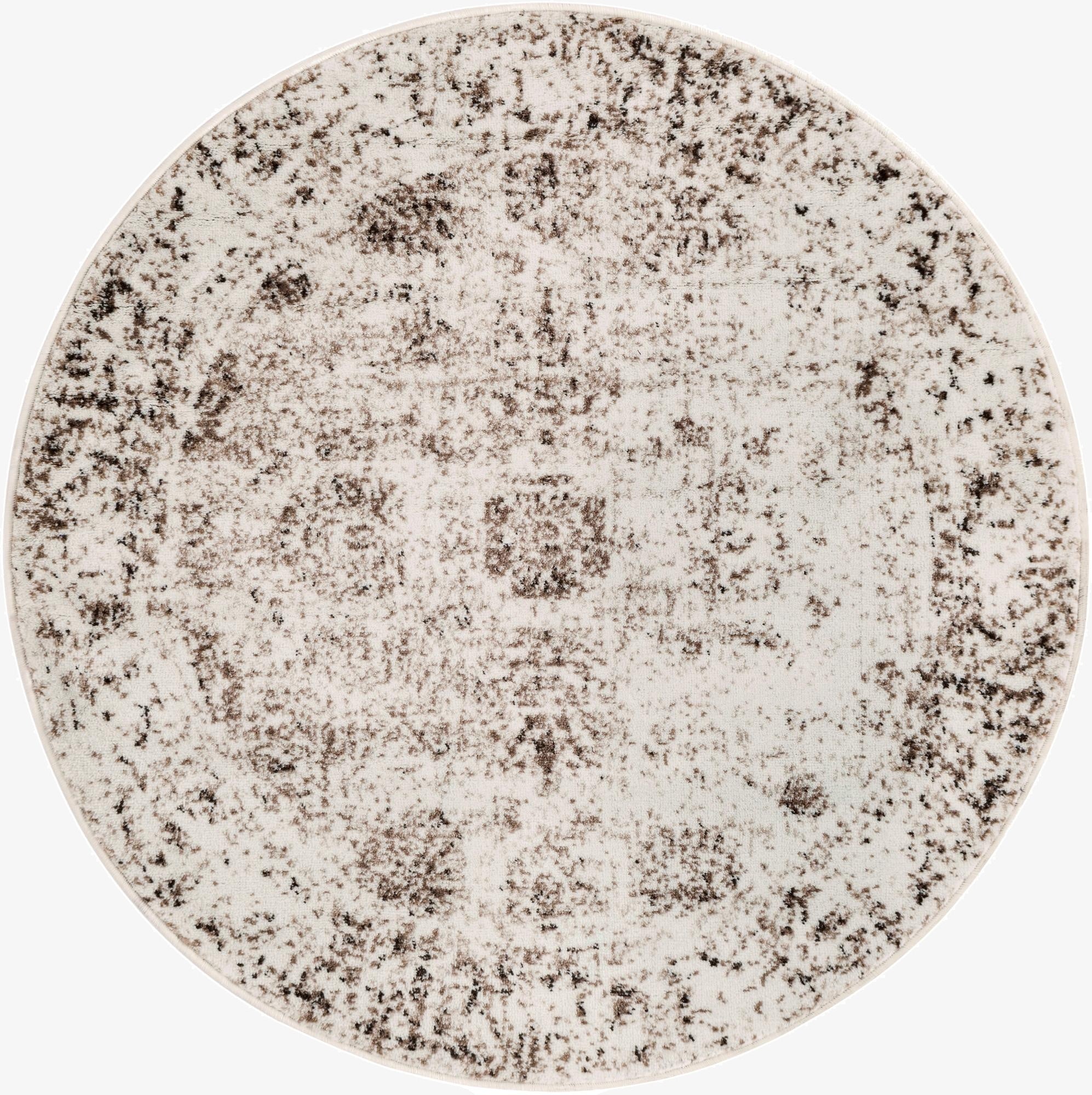 A round 4'1" x 4'1" Monte Carlo rug featuring a distressed medallion pattern in browns, tans, and ivories.