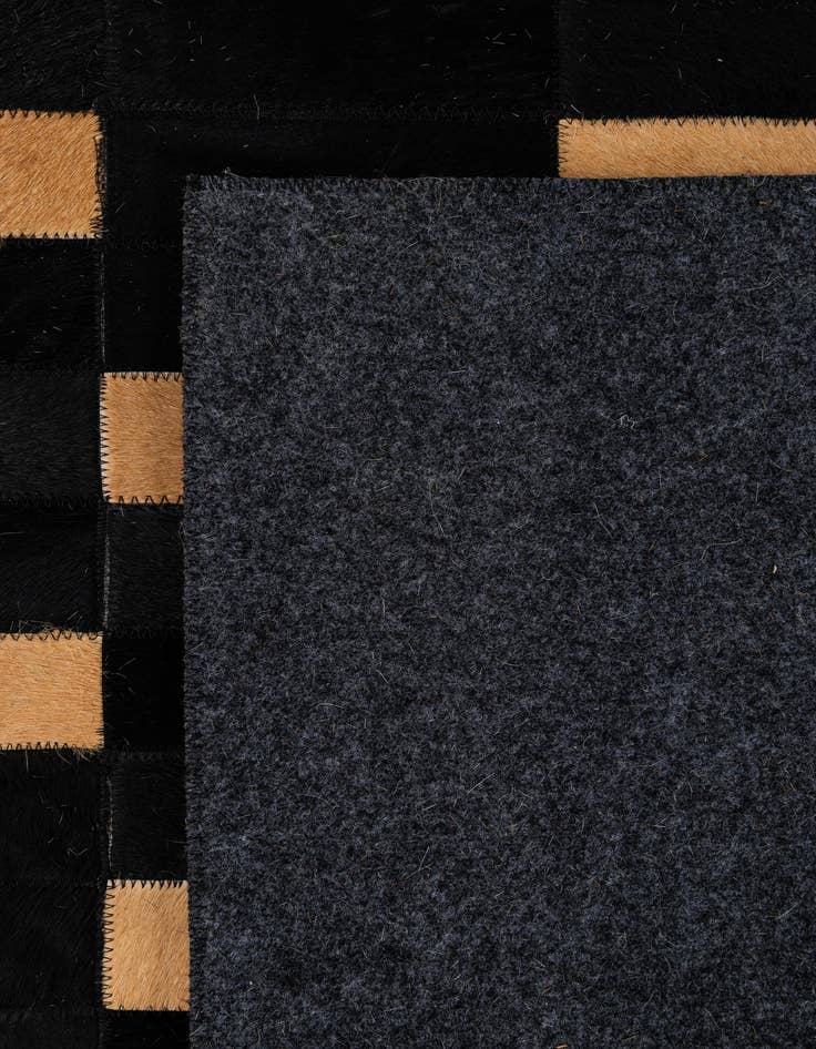 Detail image of 5' 1 x 7' 11 Cowhide - Patchwork Rug