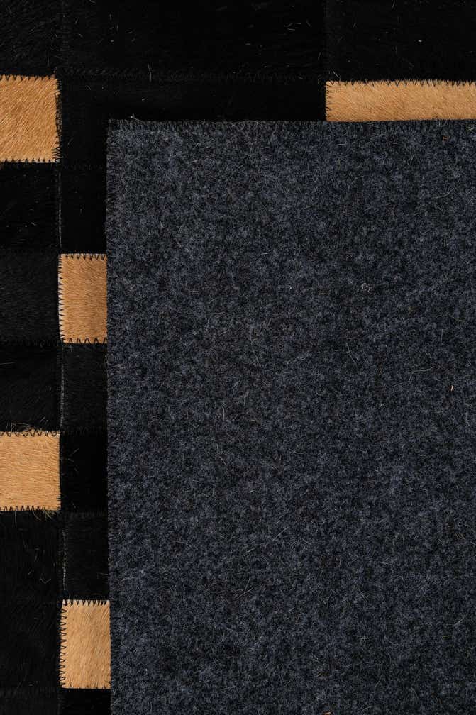 5' 1 x 7' 11 Cowhide - Patchwork Rug