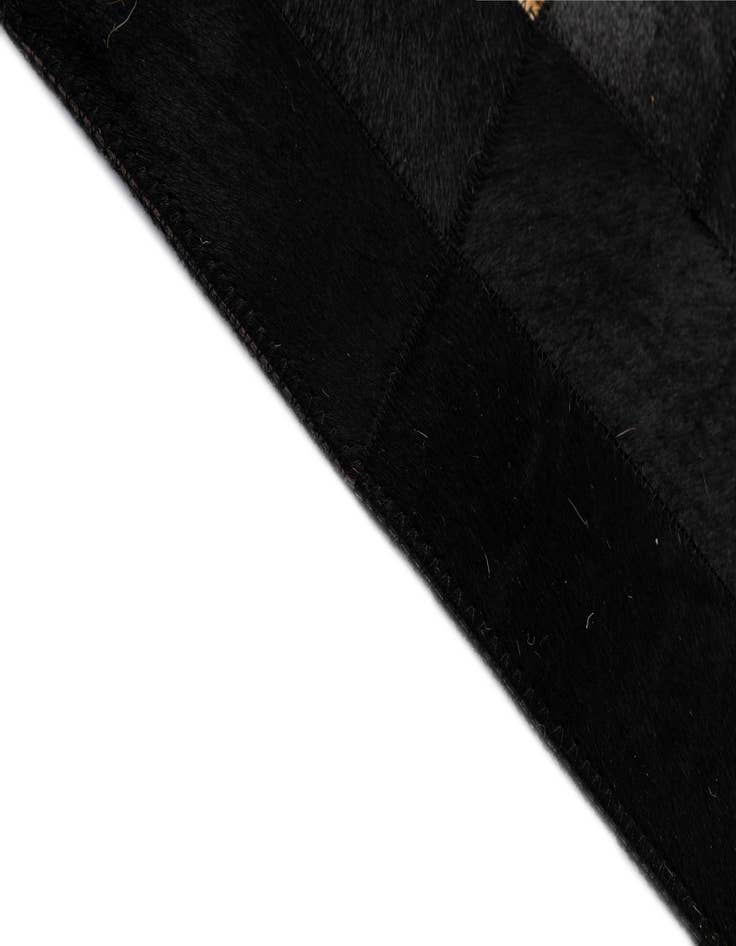 Detail image of 5' 1 x 7' 11 Cowhide - Patchwork Rug