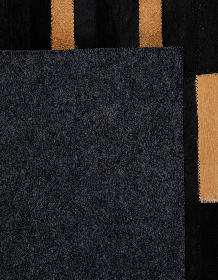 Detail image of 5' 1 x 7' 11 Cowhide - Patchwork Rug