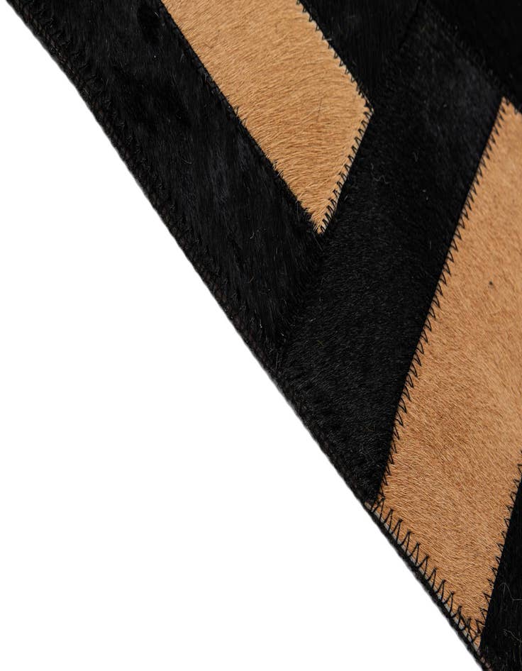 Detail image of 5' 1 x 7' 11 Cowhide - Patchwork Rug
