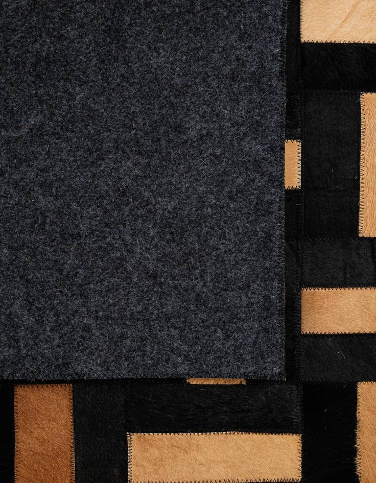 Detail image of 5' 1 x 8' Cowhide - Patchwork Rug
