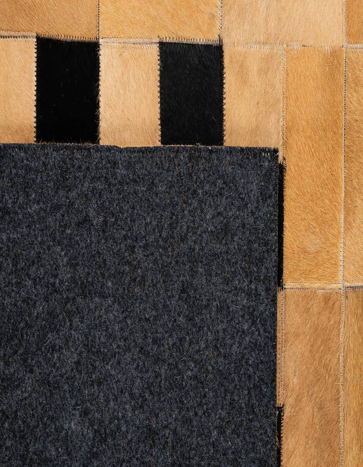 Detail image of 5' 1 x 8' Cowhide - Patchwork Rug