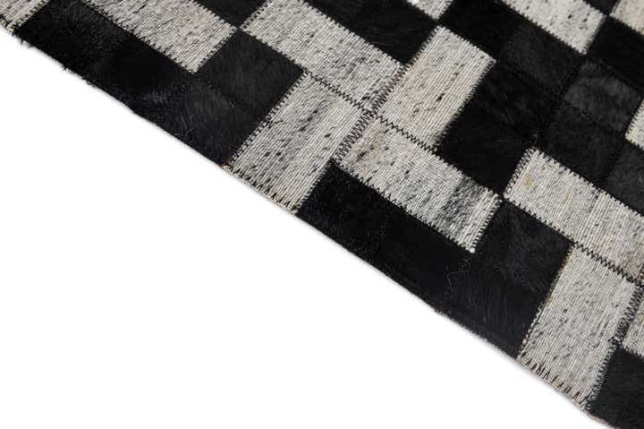 5' 2 x 8' 1 Cowhide - Patchwork Rug