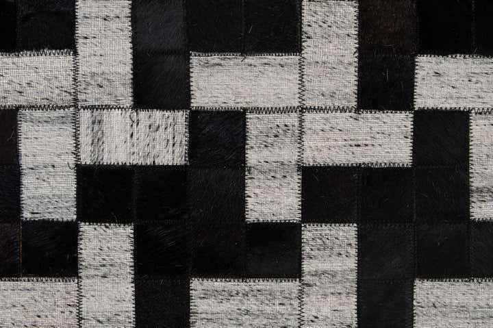 5' 2 x 8' 1 Cowhide - Patchwork Rug
