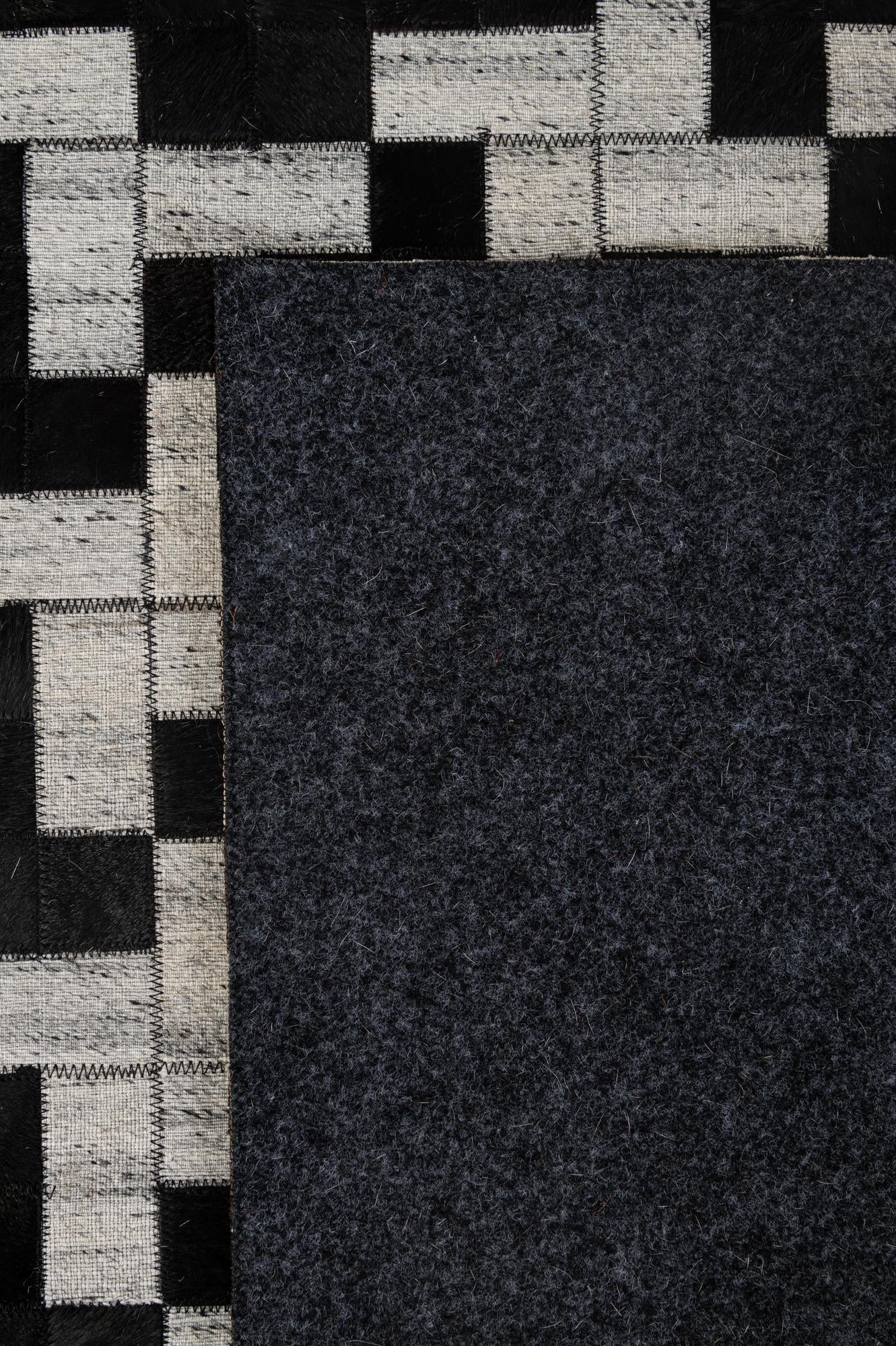 5' 2 x 8' 1 Cowhide - Patchwork Rug