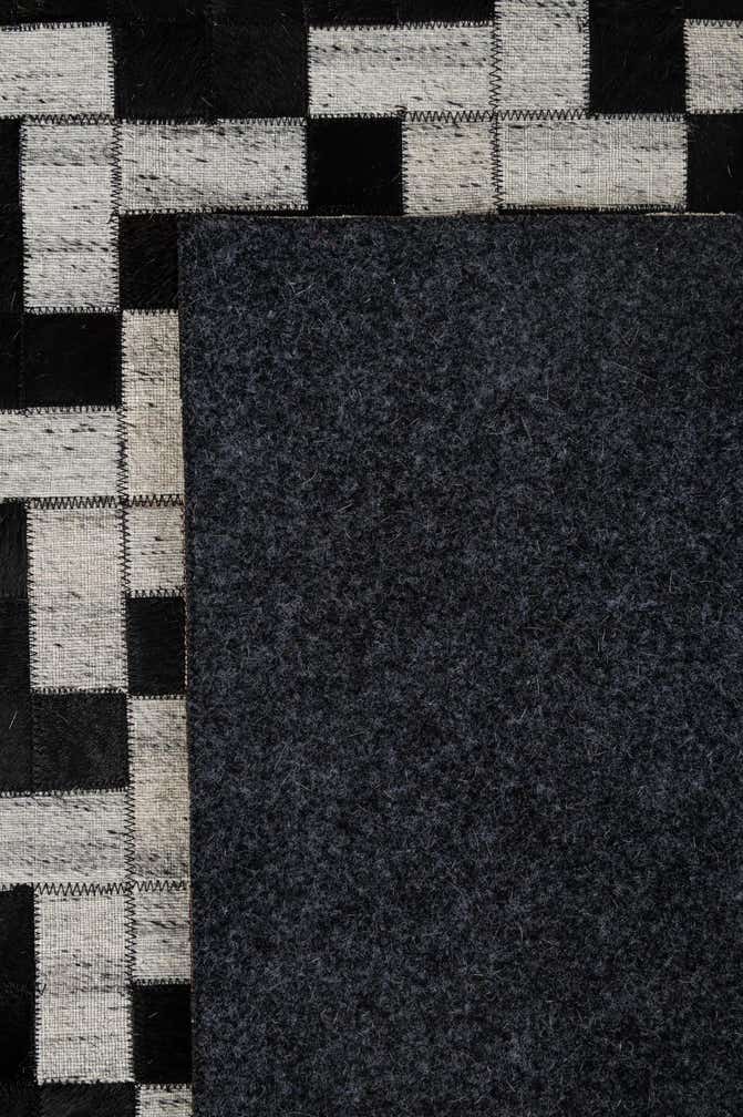 5' 2 x 8' 1 Cowhide - Patchwork Rug