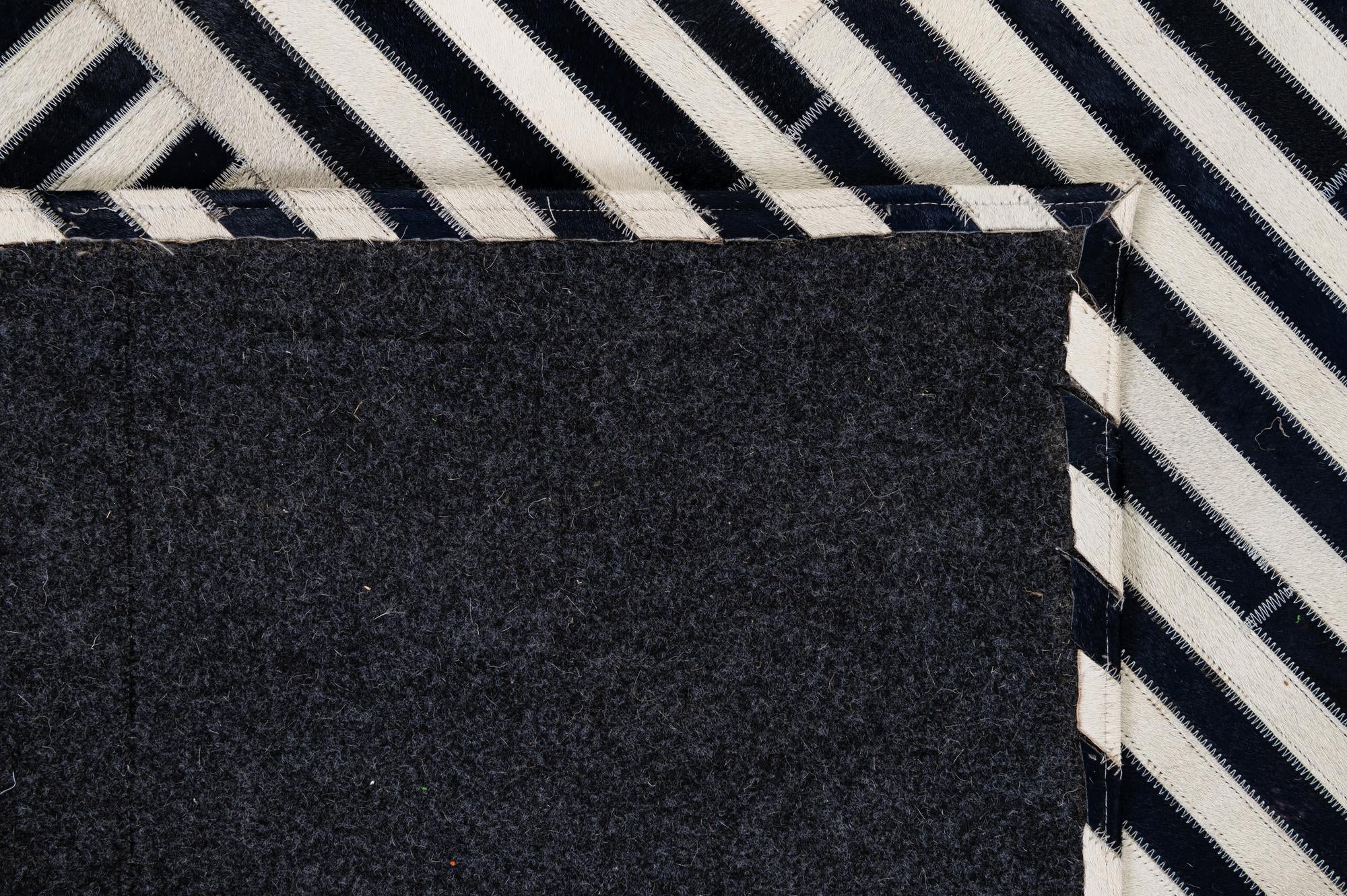 7' 11 x 10' 11 Cowhide - Patchwork Rug