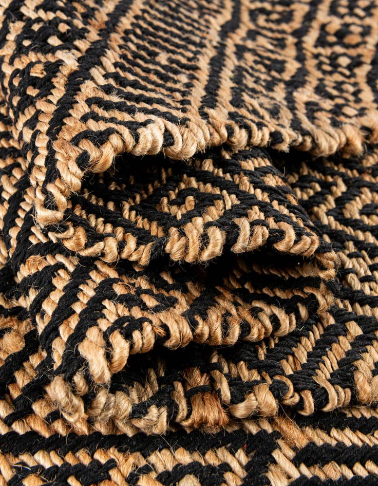 Detail image of Custom Black and Natural Handmade Braided Jute Rug