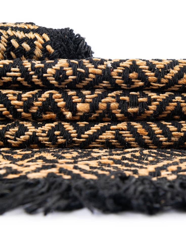 Detail image of Custom Black and Natural Handmade Braided Jute Rug