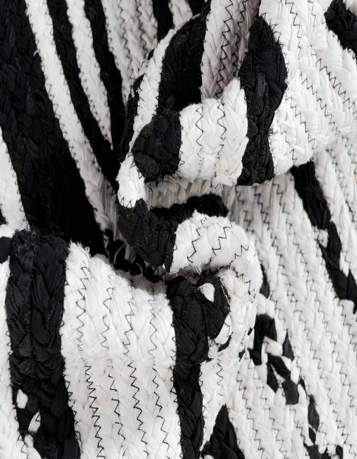 Detail image of 8' x 10'  Hand Braided Chindi Oval Rug