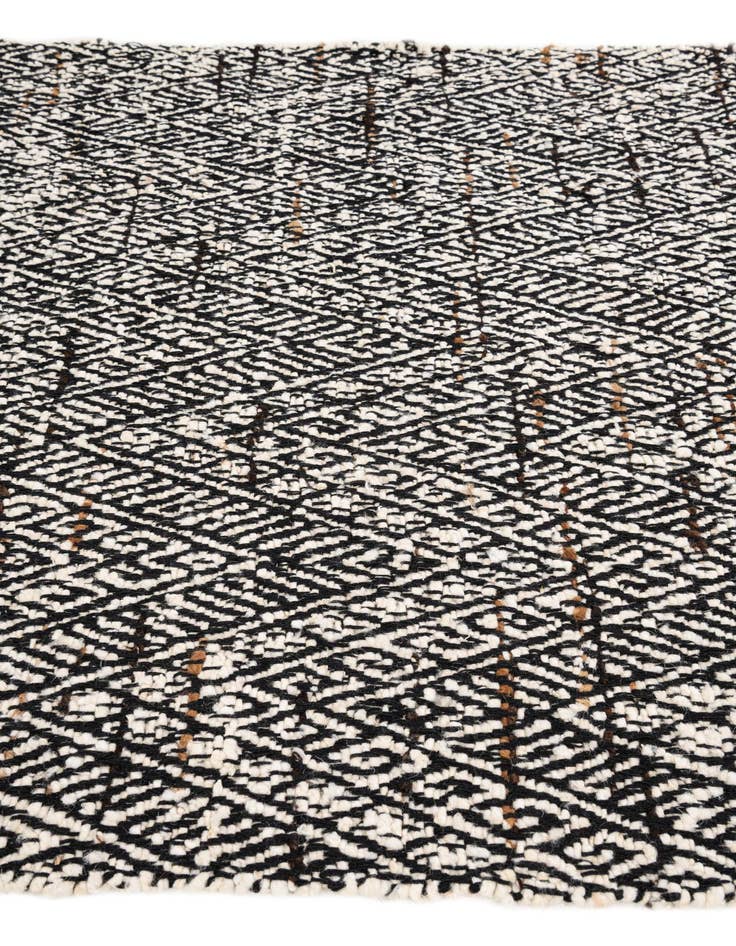 Detail image of 5' x 7' 9  Hand Braided Jute Rug