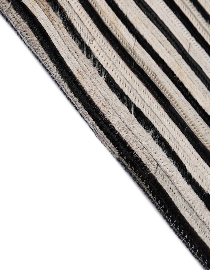 Detail image of 5' 2 x 8' Cowhide - Patchwork Rug