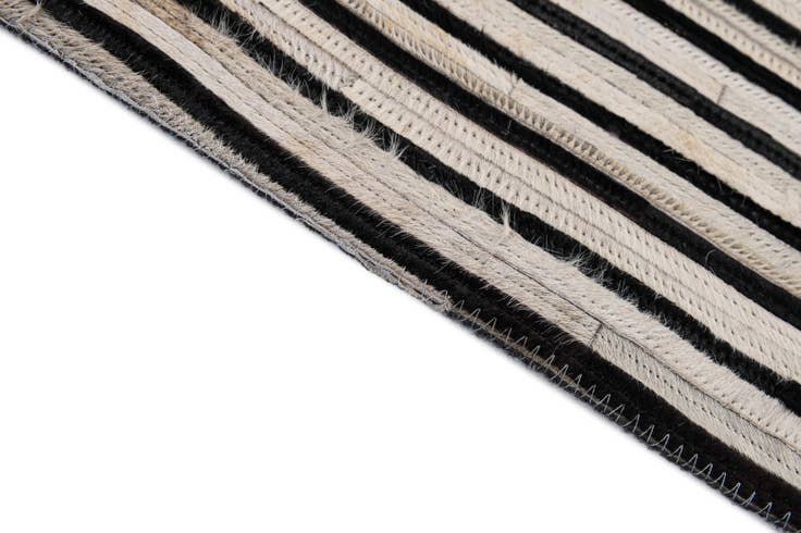 Detail image of 5' 2 x 8' Cowhide - Patchwork Rug