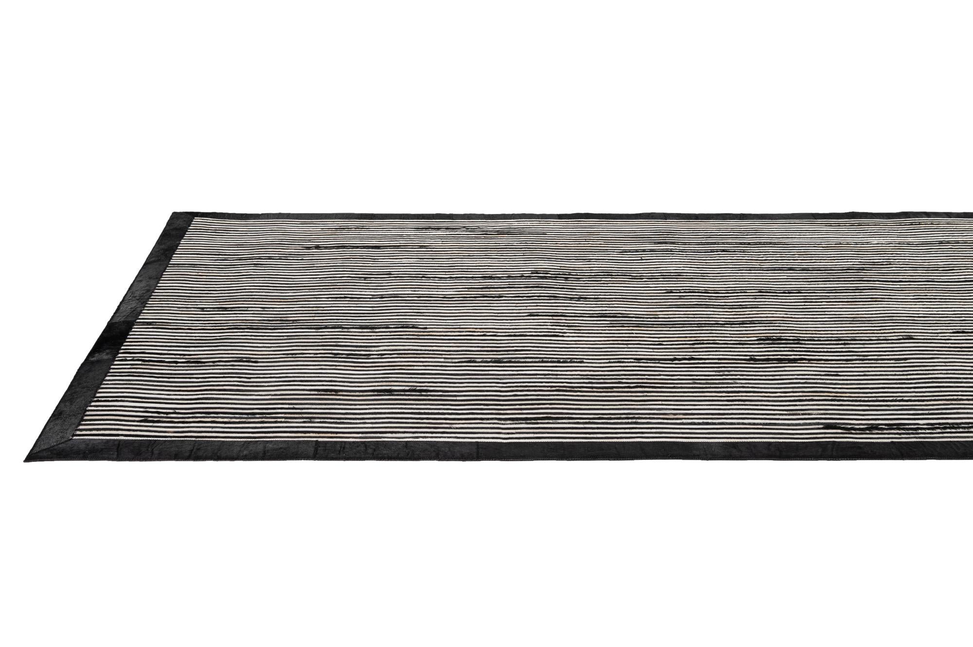 5' 1 x 7' 11 Cowhide - Patchwork Rug