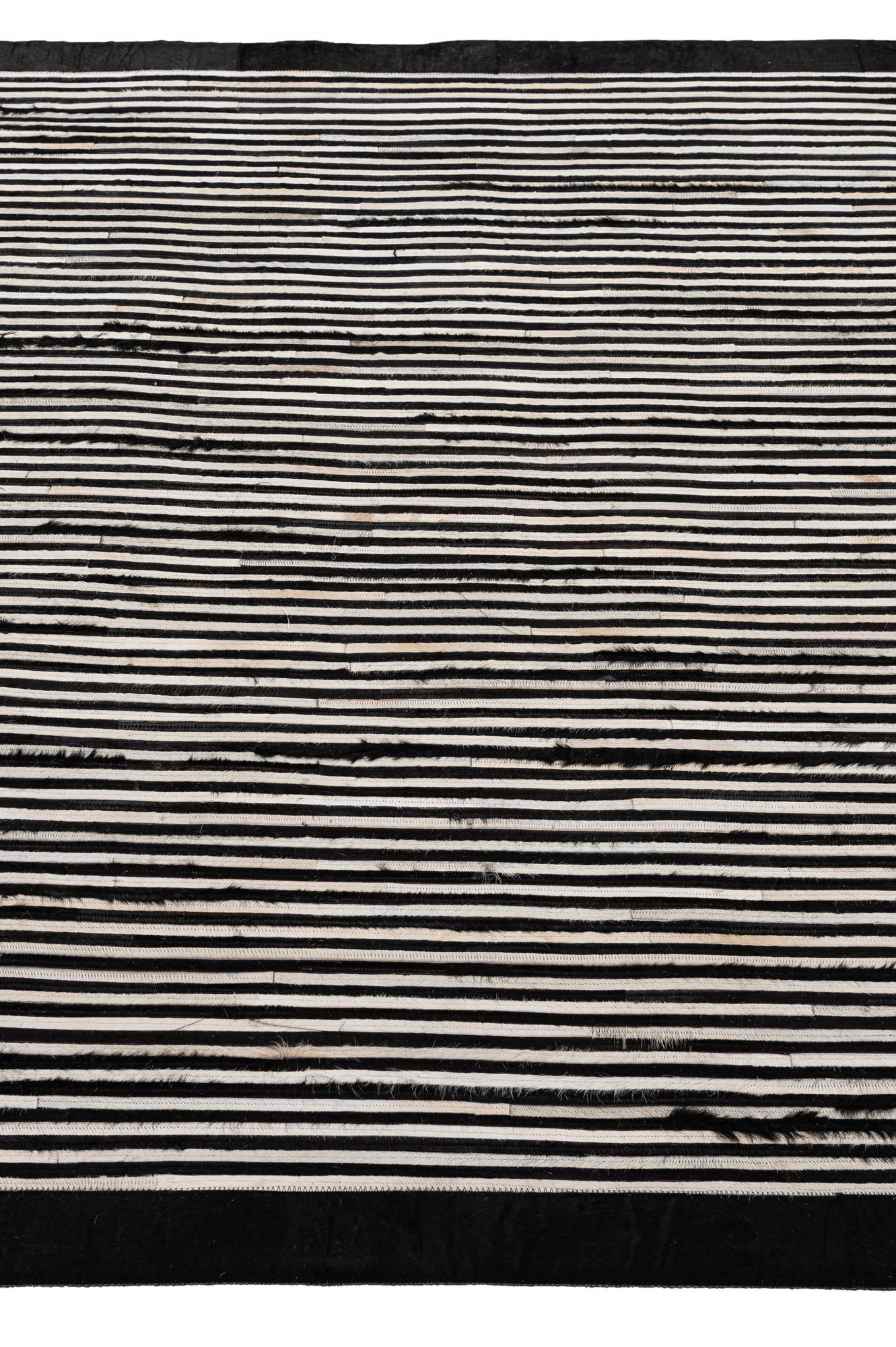 5' 1 x 7' 11 Cowhide - Patchwork Rug
