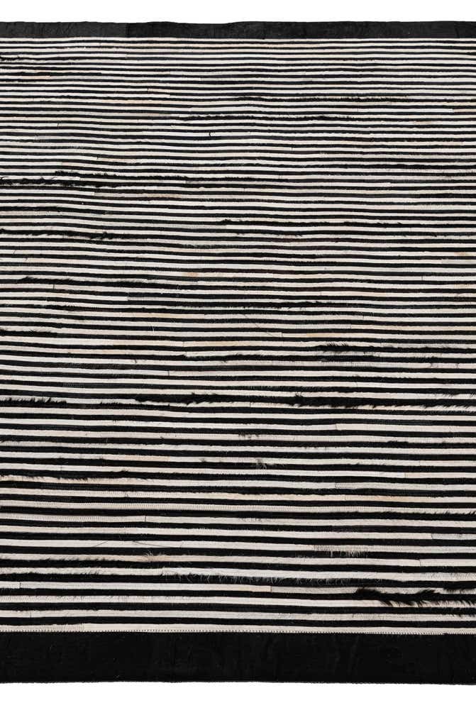 5' 1 x 7' 11 Cowhide - Patchwork Rug