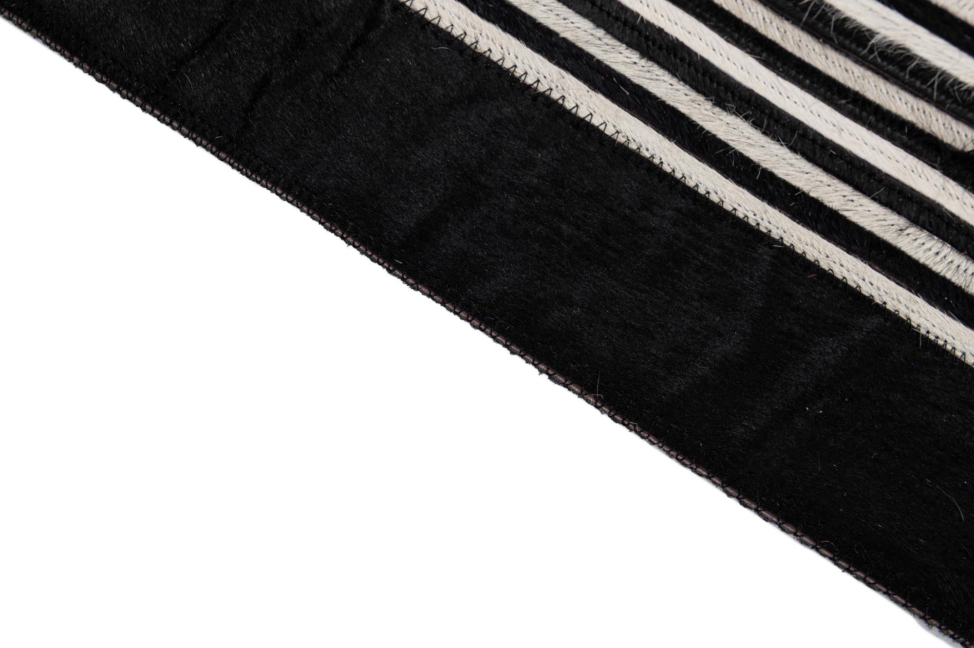 5' 1 x 7' 11 Cowhide - Patchwork Rug