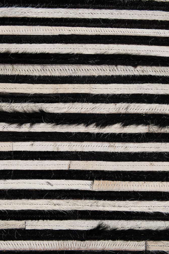5' 1 x 7' 11 Cowhide - Patchwork Rug