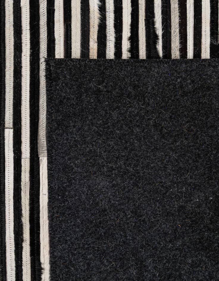 Detail image of 5' 1 x 7' 11 Cowhide - Patchwork Rug