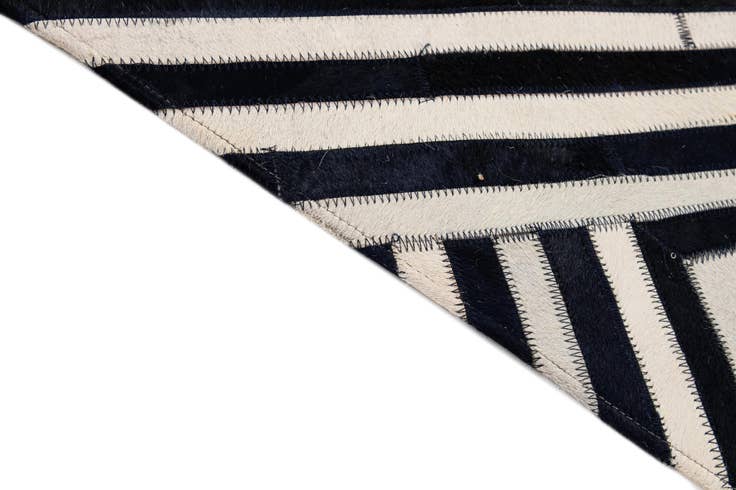 Detail image of 7' 11 x 9' 10 Cowhide - Patchwork Rug