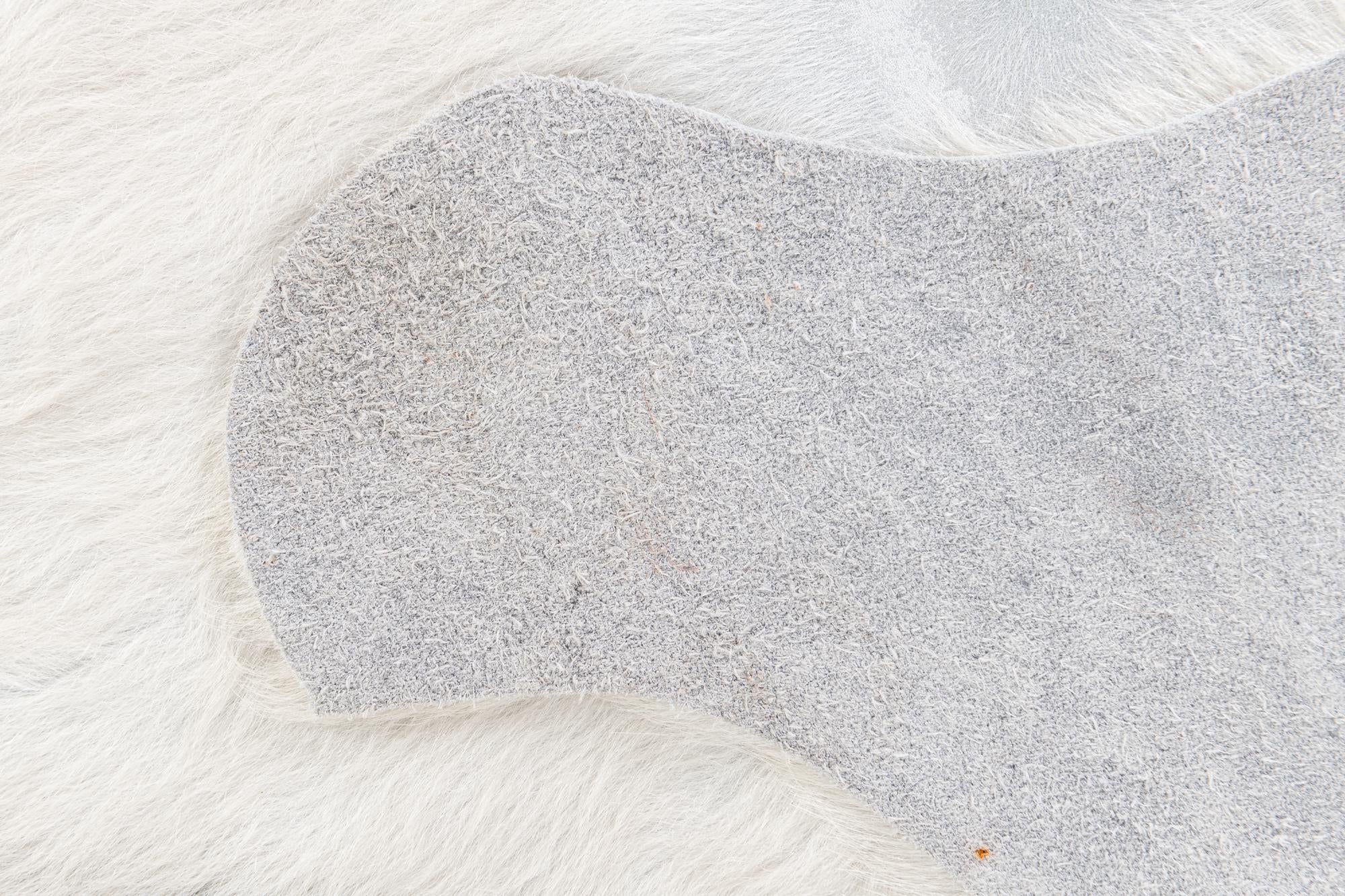 4' 4 x 4' 11 Cowhide Leather Rug