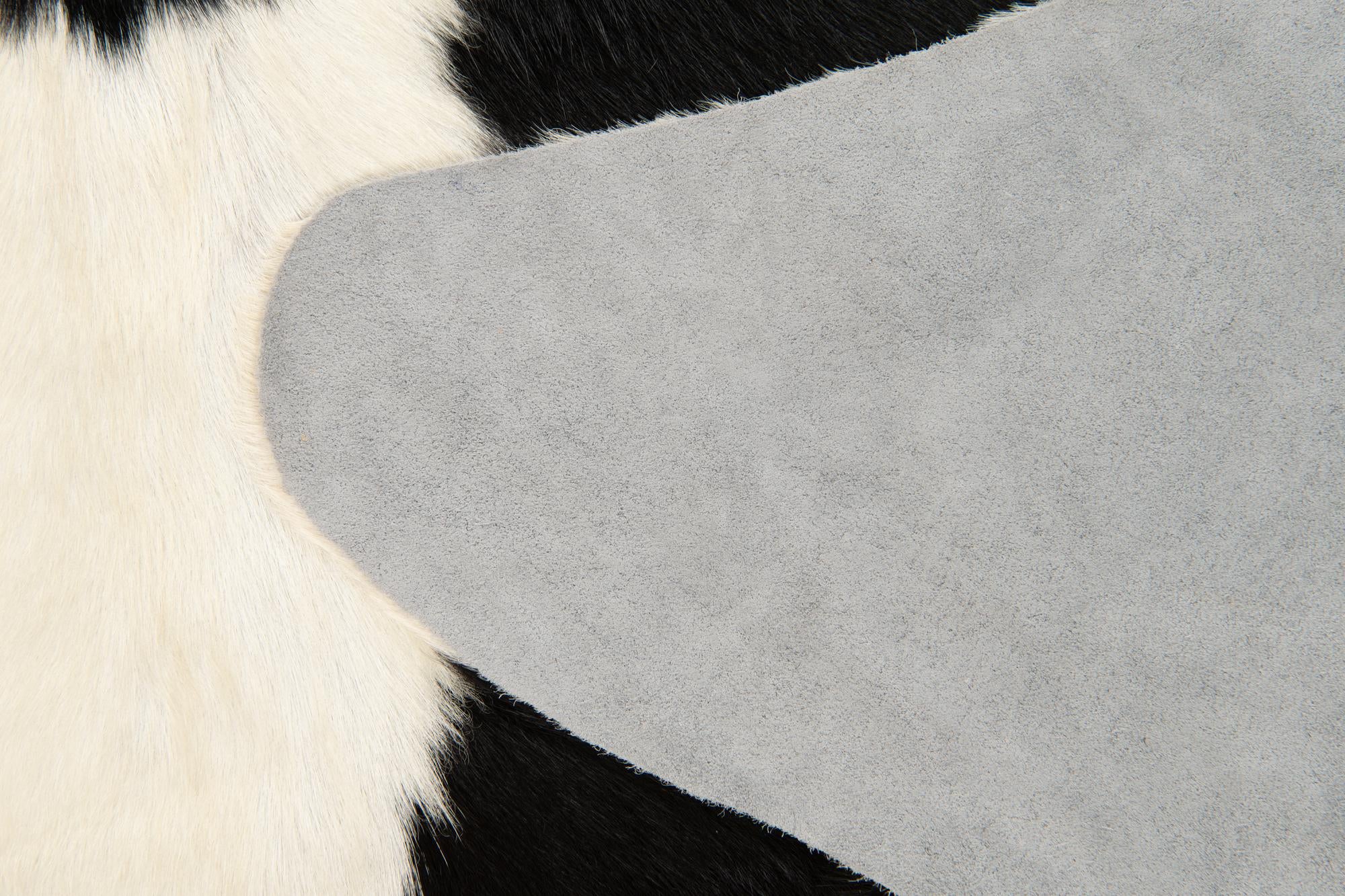 5' 6 x 6' 1 Cowhide Leather Rug