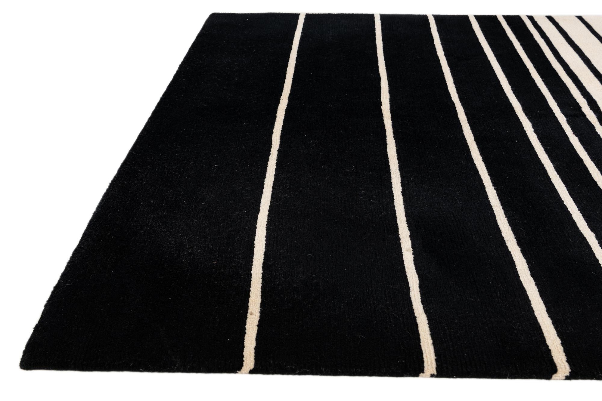 5' 8 x 7' 10 Hand Knotted Tibet Wool Rug