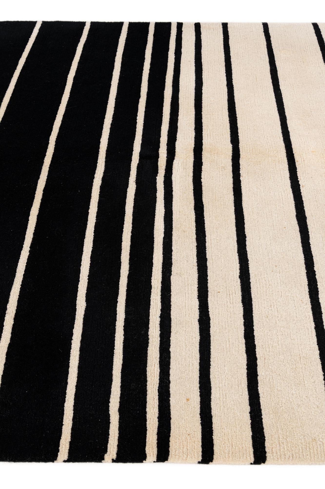 5' 8 x 7' 10 Hand Knotted Tibet Wool Rug