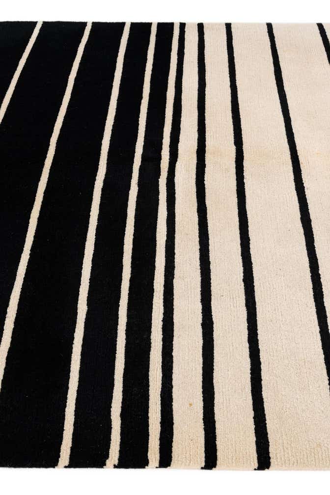 5' 8 x 7' 10 Hand Knotted Tibet Wool Rug