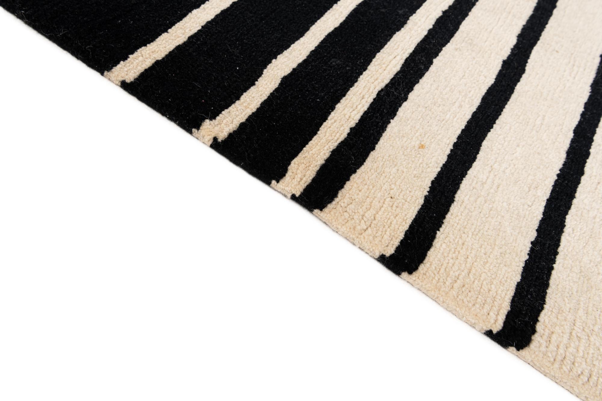 5' 8 x 7' 10 Hand Knotted Tibet Wool Rug