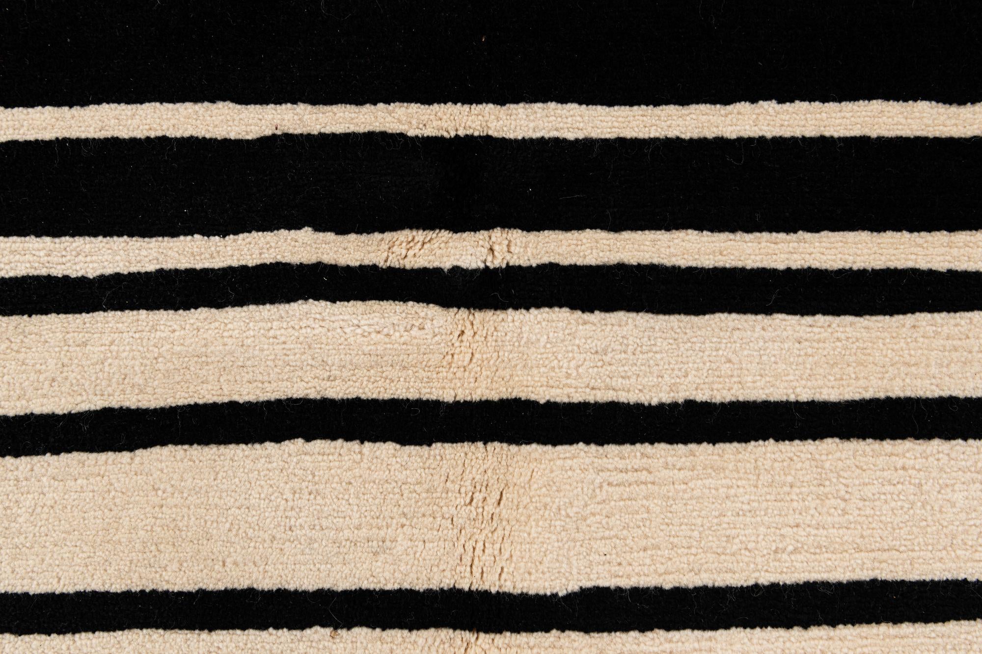 5' 8 x 7' 10 Hand Knotted Tibet Wool Rug
