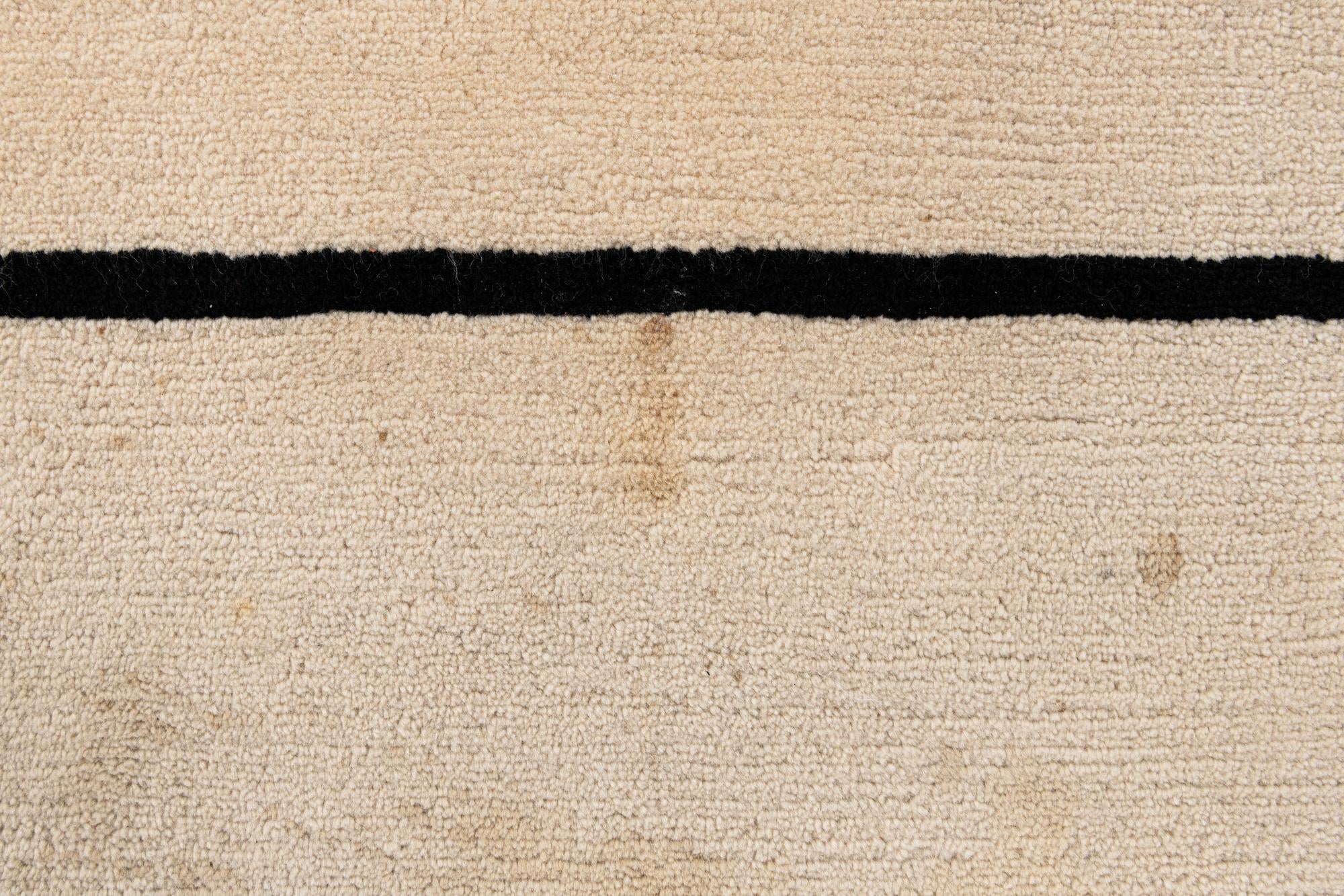 5' 8 x 7' 10 Hand Knotted Tibet Wool Rug