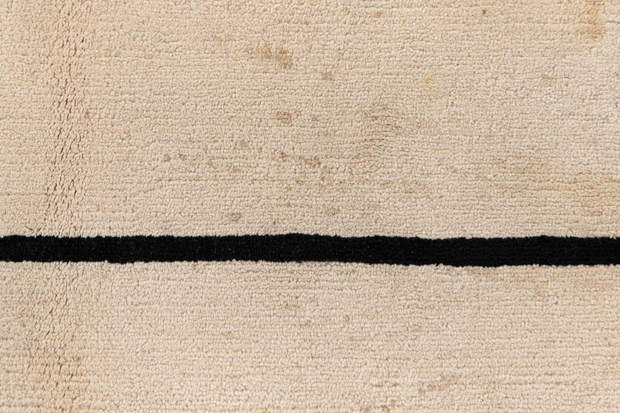 5' 8 x 7' 10 Hand Knotted Tibet Wool Rug