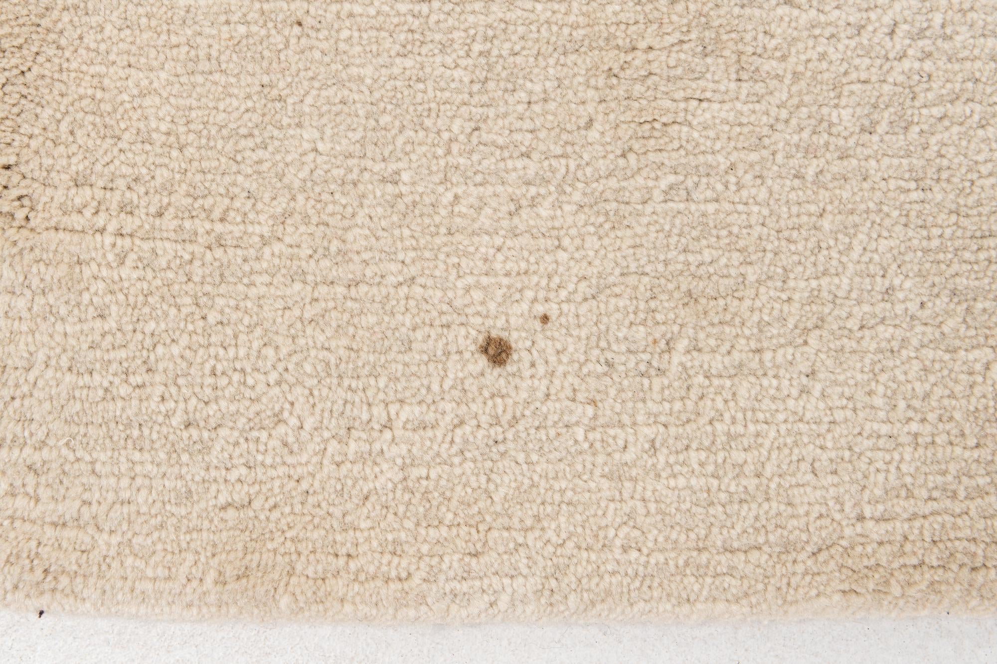 5' 8 x 7' 10 Hand Knotted Tibet Wool Rug