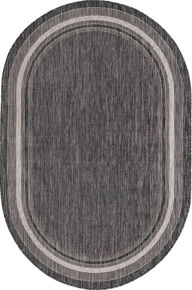 Detail image of 5' 3 x 8' Easy-Clean Border Indoor / Outdoor Oval Rug