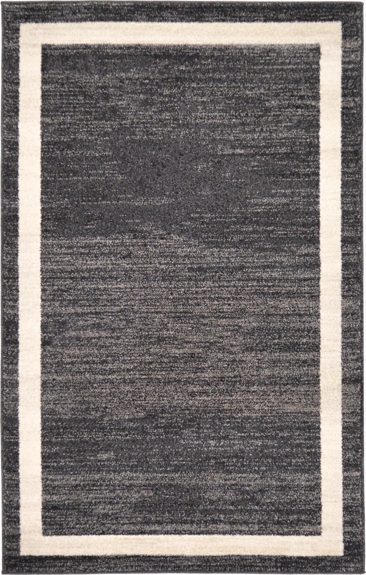 A 3x5 rectangular black area rug with a clean, solid black center and a contrasting off-white border.