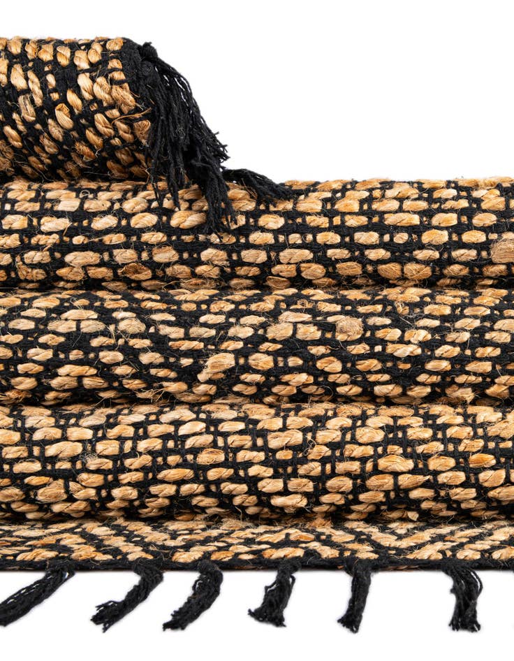Detail image of 4' 1 x 6' 1  Hand Woven Braided Jute Rug