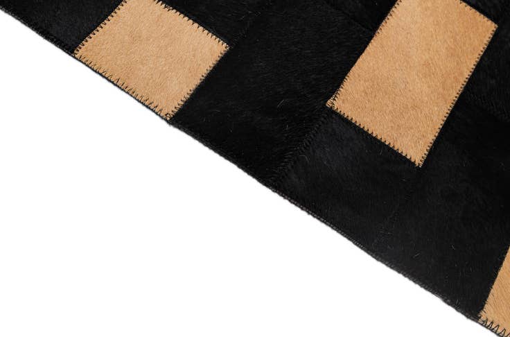 Detail image of 5' 1 x 7' 11 Cowhide - Patchwork Rug