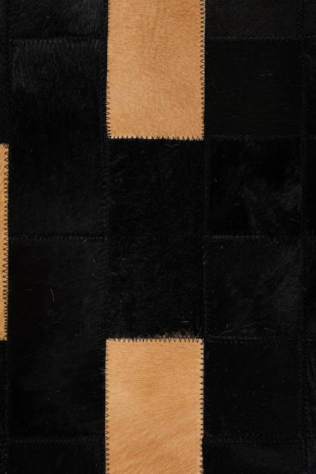 Detail image of 5' 1 x 7' 11 Cowhide - Patchwork Rug