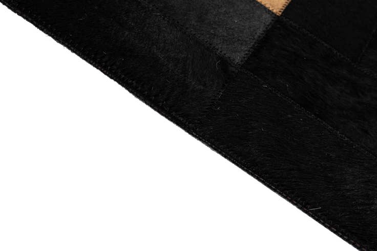 Detail image of 5' 1 x 7' 11 Cowhide - Patchwork Rug