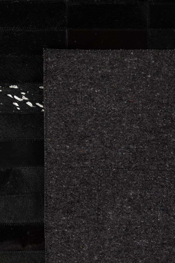 5' 3 x 8' 1 Cowhide - Patchwork Rug